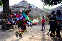 Man dancing with mask of bull on head, Formosa Island, Bijagos UNESCO Biosphere Reserve, Guinea Bissau, February 2015.