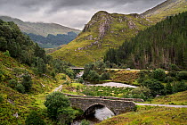 Remnants of the old military road and bridge over the River Shiel in Glen Shiel, Kintail, Scottish Highlands, Scotland, UK, September, 2016