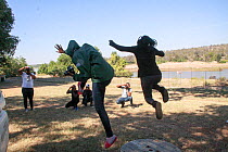 Pupil jumping during residential photography course organised by Wild Shots Outreach. Kruger National Park, South Africa, June 2017.