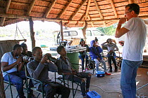 Mike Kendrick talking to pupils during residential photography course organised by Wild Shots Outreach. Kruger National Park, South Africa, June 2017.