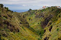 Moya village, perched on clifftop above Moya ravine, Doramas Rural Park, Gran Canaria, Canary Islands, June 2016.