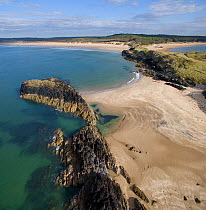 Sandwaves on beach formed by variable water flow caused by breaks in ridge of rock, Ynys Llanddwyn, Llanddwyn Island, Isle of Anglesey, Wales, UK, October 2016.