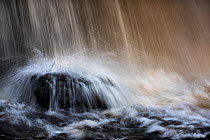 Water hitting rock, Cauldron Force waterfall, West Burton, Richmond, Yorkshire, England, UK, November.