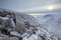 View along Lairig Ghru pass through Cairngorm Mountains with Cairn Toul peak on right, Cairngorms National Park, Scotland, UK, December 2015.
