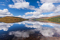 Reflections of clouds and landscape in Loch Arkaig, Glen Dessary, Lochaber, Scotland ,UK, September 2016.