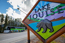 Location sign for Lake Louise featuring a grizzly bear, Lake Louise, Banff National Park, Alberta, Canada, June