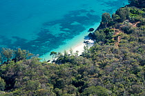 Aerial view of coastal landscape and beach surrounded by dry deciduous forest at Anjajavy Private Reserve. After hours of flying from Antananarivo this was one of the very few areas with some forest l...