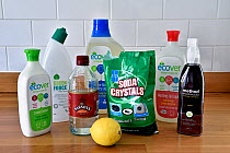 Environmentally friendly household cleaning products on kitchen work surface. London, UK