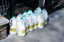 Milk delivered in plastic bottles to doorstep, Highbury, London Borough of Islington England UK, April 2015.