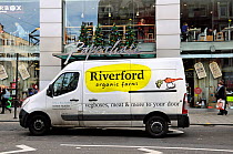 Riverford Organic Farms Van on its way to deliver veg / vegetable boxes, Tottenham Court Road, Central London England, UK, December 2013,