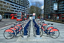 Santander Cycles or Boris Bikes, bicycle hire scheme docking station, corner of Hampstead Road and Euston Road, Camden, England, Britain, UK, March 2016.