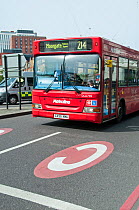 Single-decker bus entering congestion charge zone, Old Street Roundabout, London Borough of Islington, England, UK, June.