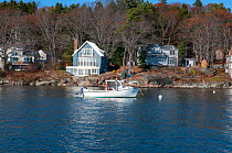 Small lobster fishing boat on the coast of Yarmouth, Maine, USA, November 2016.
