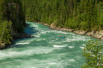 People rafting on the Fraser River, Rearguard Falls Provincial Park, British Columbia, Canada. July 2010.