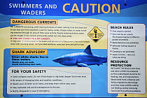Great White Shark (Carcharodon carcharias) warning sign, Cape Cod, Massachusetts, USA, August.
