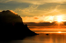 Islet of Es Vedr, at sunset,  Ibiza, Biodiversity and Culture UNESCO World Heritage Site, Ibiza, Spain, February 2008.