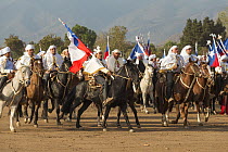 Traditionally dressed horse riders participating in Cuasimodo, a Catholic festival, Colina, Chacabuco Province, Santiago Metropolitan Region, Chile, Latin America. April 2017.