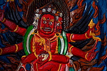 Painting of a wrathful deity in Lama Buddhist temple in Wenquan town, Tibetan Plateau, Qinghai, China