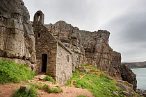 St Govan's Chapel built in the 14th century, into cliffs of Carboniferous Limestone near St Govan's Head, Bosherston, Pembrokeshire, Wales, UK, May
