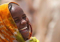 Ouled Rachid tribeswoman laughing, Kashkasha village near Zakouma National Park, Chad, 2010.