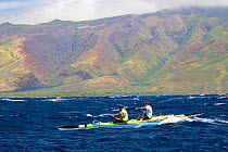 Two man paddle team of Mark Shimer and Bear Keahi in the Maui Canoe and Kayak Club's 2014 Maui to Molokai race from DT Fleming Beach to Kaunakakai Harbor, Hawaii.