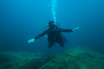 Photographer Michel Roggo underwater on location for  The Freshwater Project,  Lake Malawi,  2015.
