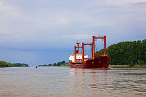 Ship  on the main channel of the Danube river, the Bratul Sulina, at Crisan, Danube Delta Biosphere Reserve, UNESCO World Heritage Site, May 2014 . Photographed for The Freshwater Project