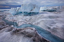 Meltwater channels flowing into meltwater lake, with collapsed ice cover Sermeq Kujalleq Glacier, Ilulissat Icefjord UNESCO World Heritage Site. Sermersuaq / Greenland ice sheet, Greenland, August. Ph...