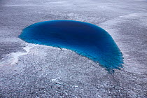 Aerial view of meltwater lake on the ice cap north-east of Sermeq Kujalleq Glacier, Ilulissat Icefjord UNESCO World Heritage Site,  Sermersuaq / Greenland ice sheet, Greenland, August 2014. Photograph...