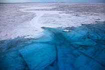 Aerial shot of Meltwater lake on the ice cap north-east of Sermeq Kujalleq Glacier, Ilulissat Icefjord UNESCO World Heritage Site, Sermersuaq / Greenland ice sheet, Greenland. August 2014. Photographe...
