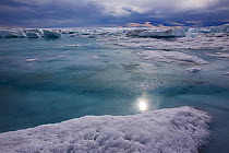 Meltwater channels flowing meltwater lake on the ice cap north-east of Sermeq Kujalleq Glacier, Ilulissat Icefjord UNESCO World Heritage Site, Greenland. August 2014. Photographed for the Freshwater P...