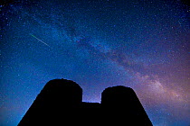 Perseid meteors over the White Castle, Brecon Beacons National Park, International Dark Sky Preserve, Monmouthshire, Wales, UK, August.