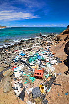 Plastic waste discarded at sea washed up by trade winds onto Molokai Island, Hawaii. July.