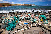 Plastic marine waste incuding fishing nets washed up by trade winds onto Molokai Island, Hawaii. July.