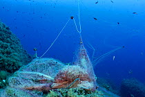 Abandoned fishing nets, Ponza Island, Italy, Tyrrhenian Sea, Mediterranean.