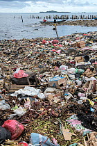Marine pollution on beach near Sorong Fish Market, Bos Wesen Market, Sorong, West Papua, Indonesia