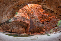 Wide angle view of canyon in Bungle Bungle Range, beehive shaped karst sandstone formation formed by erosion, with dark lines formed by cyanobacteria. Purnululu National Park, UNESCO World Heritage Si...