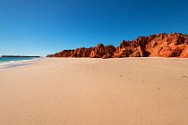 White sand beach with sandstone cliffs, Dampier Peninsula, Kimberley, Western Australia. July 2016.