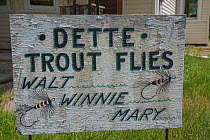 Family run fly fishing shop sign for Dette Trout Flies, Beaverkill River, New York, USA, May.