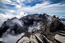 Clouds rolling into Low's Gully, as seen from the summit of Mount Kinabalu,  (4,095m) Borneo, May 2013.