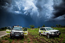 Vehicles with very dark storm clouds in Western Australia, December 2013.