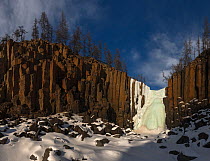 Frozen waterfall and basalt cliffs, Putoransky State Nature Reserve, Putorana Plateau, Siberia, Russia
