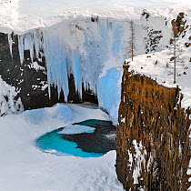 Frozen waterfall in Putoransky State Nature Reserve, Putorana Plateau, Siberia, Russia, April.