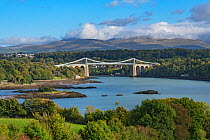 Menai Suspension Bridge designed by Thomas Telford, viewed from Anglesey across the Menai Strait, North Wales, UK, October 2017.