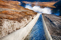 Water flowing out of the Karahnjukar dam and Halslon reservoir, a massive new controversial hydro electricity project in North East Iceland. It was created by damming the Jokuls a Dal river and floodi...
