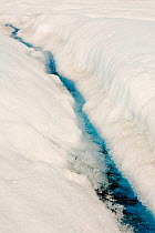 Melt water on the Greenland ice sheet near camp Victor north of Ilulissat, Greenland, July 2008.