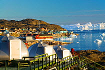 Igloos outside the Arctic Hotel, Ilulissat UNESCO World Heritage Site,  Greenland. July 2008.