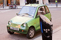 G-Wiz electric car on the streets of London, England, UK, December 2009.