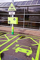 Electric car recharging station at the Charnock Richard M6 motorway service station, Lancashire, England, UK. 2012