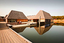 The Brockholes visitor centre at the Lancashire Wildlife Trust reserve in Preston, Lancashire, UK. The Brockholes reserve is a wetland habitat constructed from old gravel pit workings. The green visit...